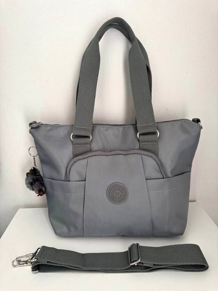 Bolso kipling gris espacioso para viaje y deporte - Moda Mujer | Comprar Online Lima